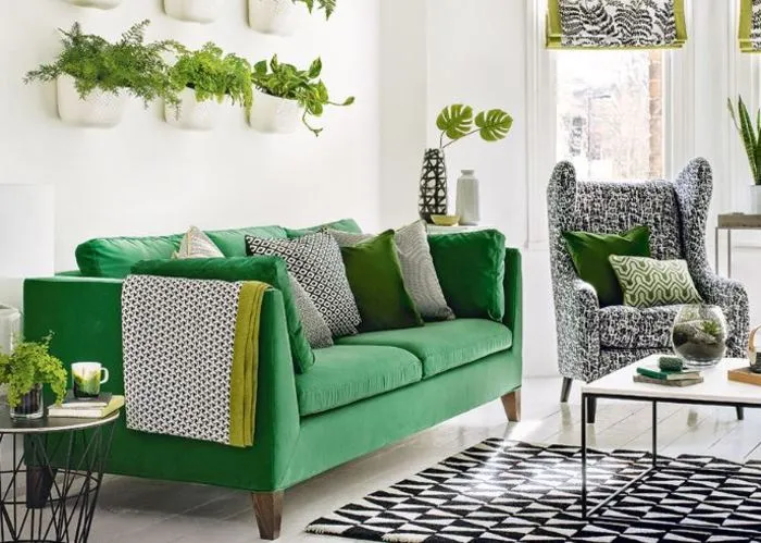 Sofa bọc nỉ màu xanh lá cây tươi mới, phù hợp với không gian sống xanh