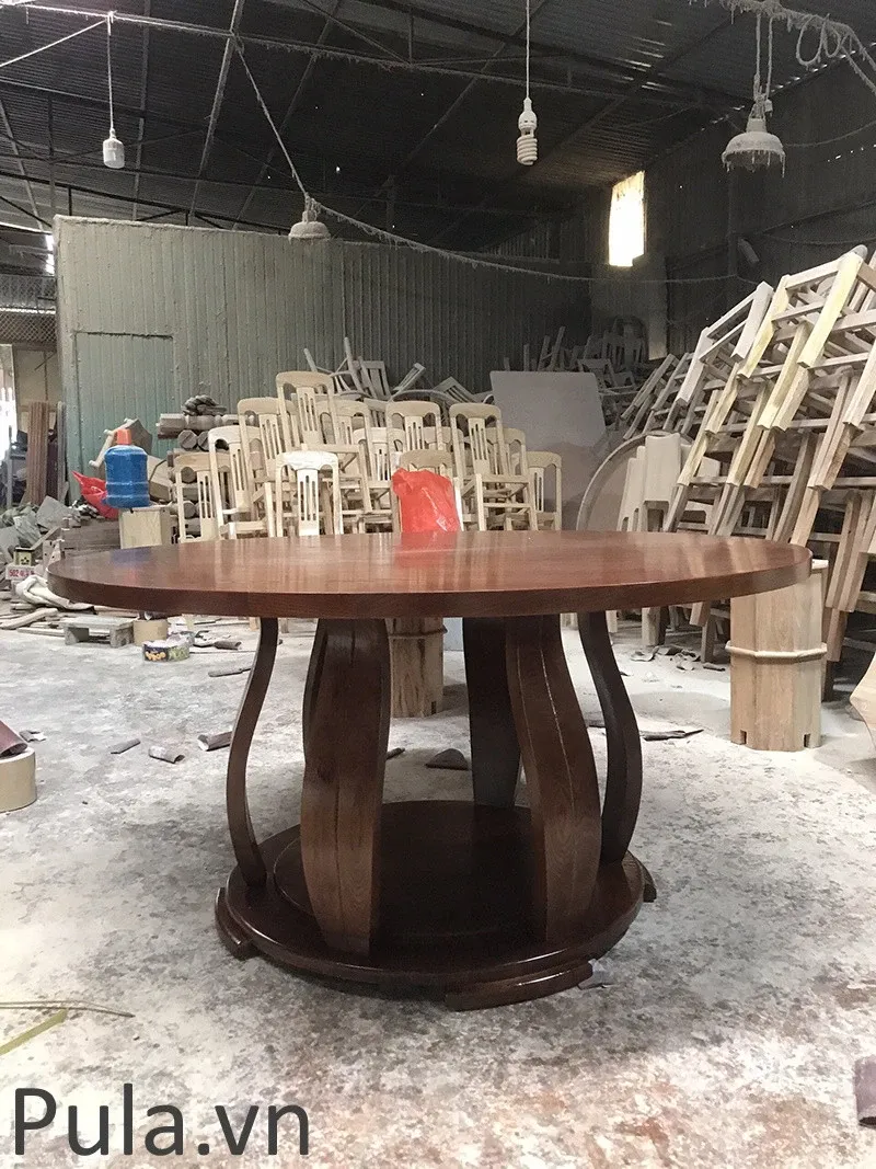 Bàn ăn tròn xoay gỗ sồi sơn nâu, chân bàn thiết kế mới hiện đại