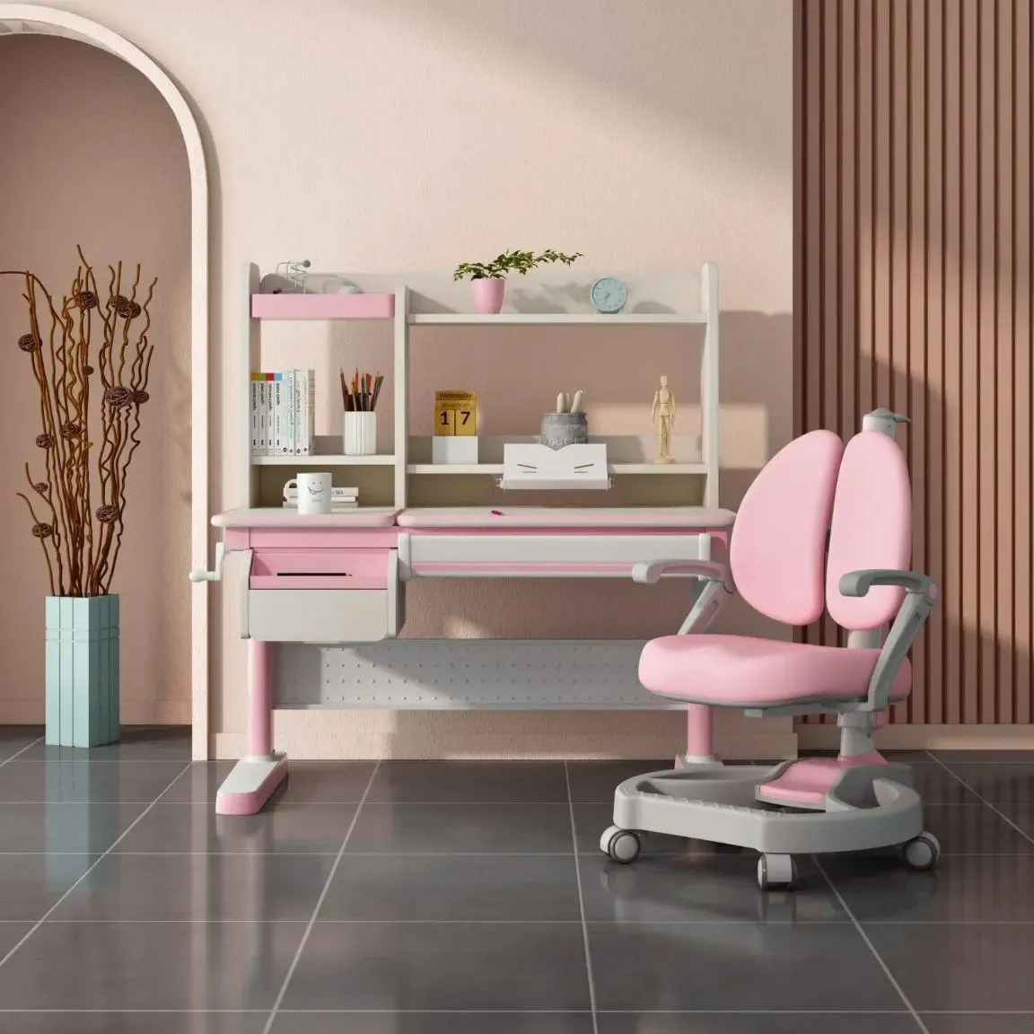 Bàn học màu hồng nâng hạ chiều cao giúp đáp ứng được nhu cầu sử dụng và tiết kiệm kinh phí cho bố mẹ