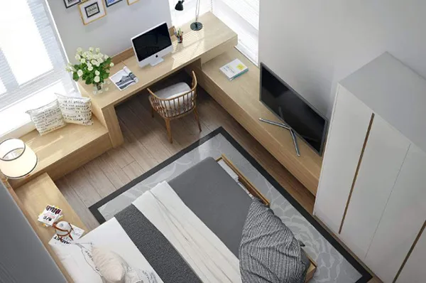 Không nên bố trí bàn làm việc tựa lưng vào cửa