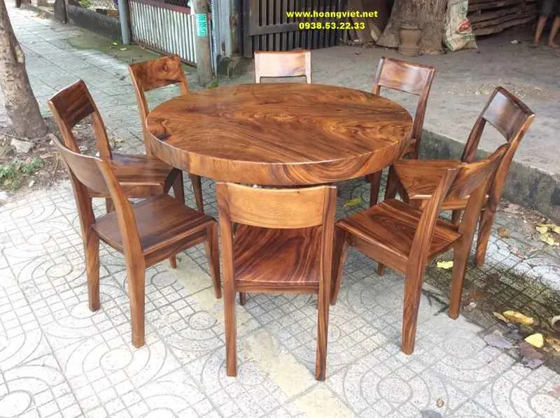 Bàn ăn tròn 8 ghế gỗ me tây nguyên khối