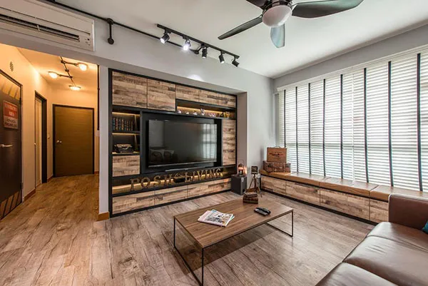 Phòng khách tông nâu xám với sàn và nội thất mộc mạc