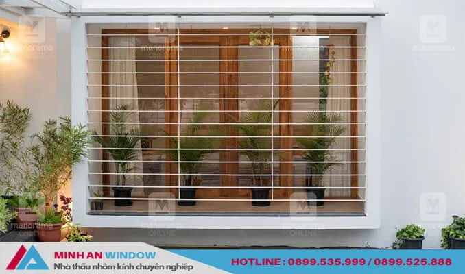 Mẫu Cửa sổ nhôm kính 2 cánh mở quay vân gỗ cho các biệt thự đẹp