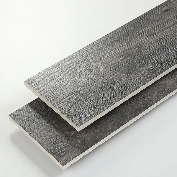 Sự đơn giản, thanh lịch của gạch ốp chân tường dọc vân gỗ xám trơn khiến không gian trở nên nhẹ nhàng hơn