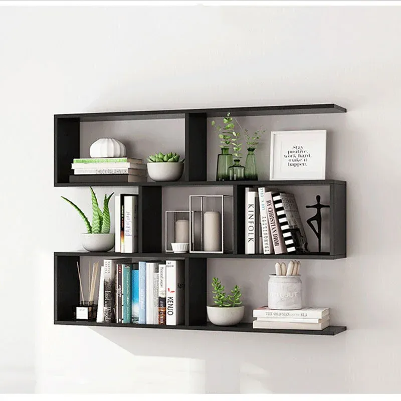 Kệ gỗ treo tường giúp tối ưu không gian lưu trữ phòng ngủ