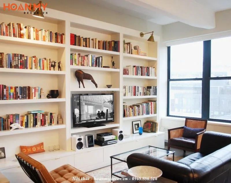 Thi công kệ tivi kết hợp tủ sách gỗ công nghiệp trong không gian phòng khách tân cổ điển