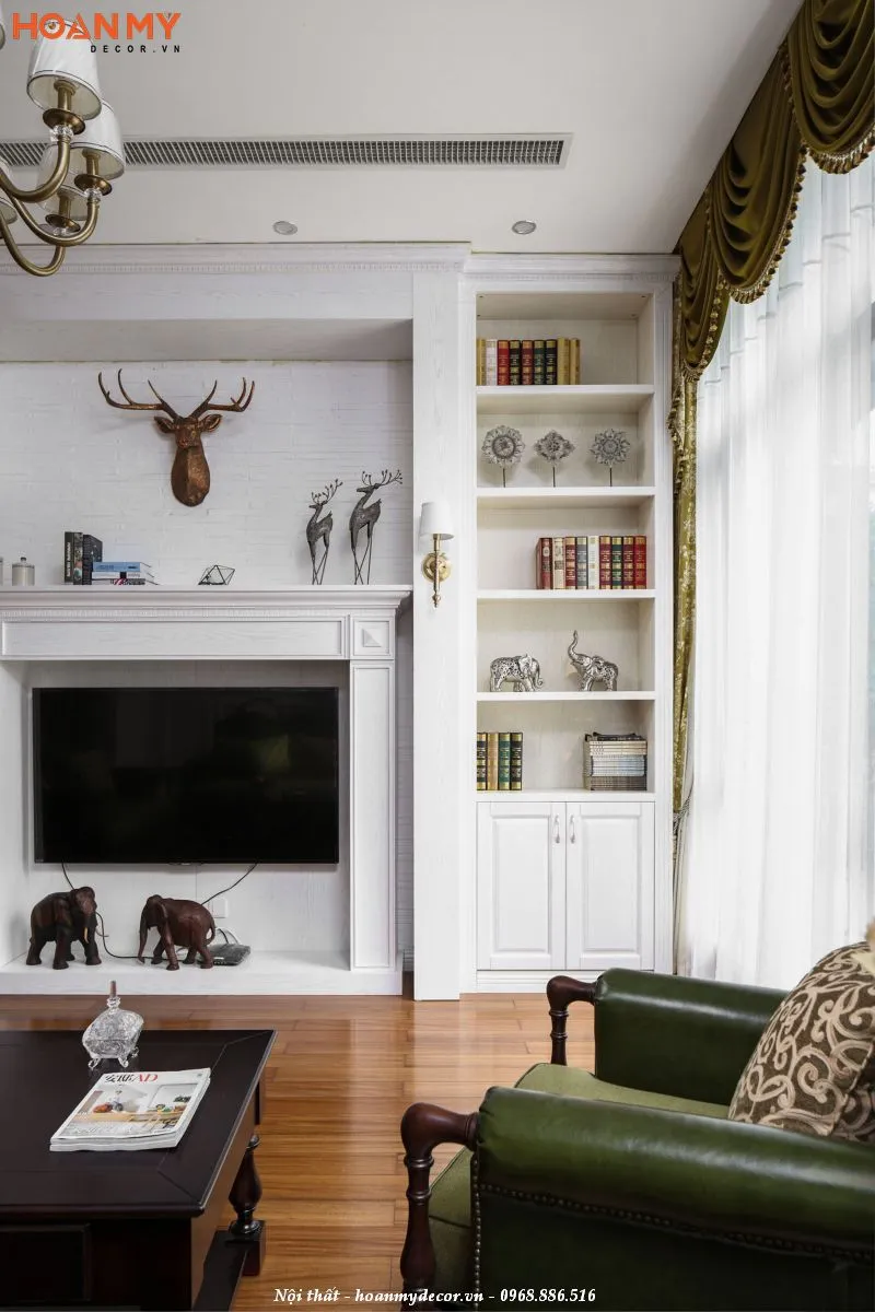 Mẫu kệ tivi kết hợp với giá sách thiết kế độc đáo, sáng tạo theo phong cách tân cổ điển