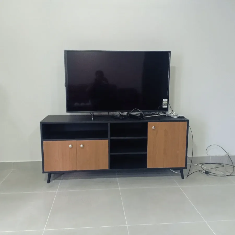 Thiết kế tủ kệ tivi chữ L tận dụng tối đa không gian phòng khách