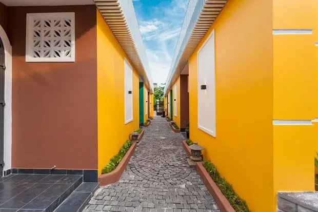 Khách sạn Ở Đâu Đây Boutique Vũng Tàu lấy màu vàng làm điểm nhấn
