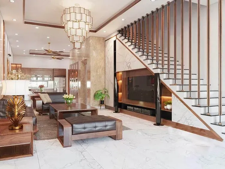 Mẫu phòng khách nhà ống này mang hơi hướng tân cổ điển với đèn chùm có thiết kế lạ mắt, kết hợp với nội thất và đá ốp cao cấp, góp phần làm cho phòng khách trở nên sang trọng và đẳng cấp hơn.