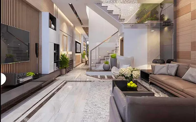 Những chậu cây cảnh luôn mang đến cho không gian phòng khách sự rộng rãi, thoáng mát, không chỉ tạo cảm giác gần gũi với thiên nhiên mà còn có tác dụng khử độc và bảo vệ sức khỏe cho các thành viên trong gia đình.