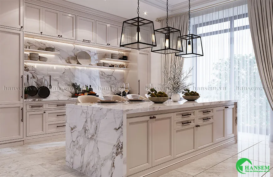 Màu trắng chủ đạo kết hợp bề mặt đá tự nhiên tạo nên không gian bếp ấm cúng và nhẹ nhàng