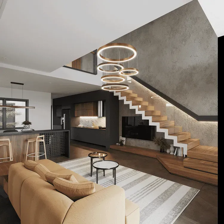 Phòng khách rộng rãi, sáng và thông thoáng với không gian liền kề cầu thang trong nhà ống 5m, tạo cảm giác thoải mái cho cả gia đình.