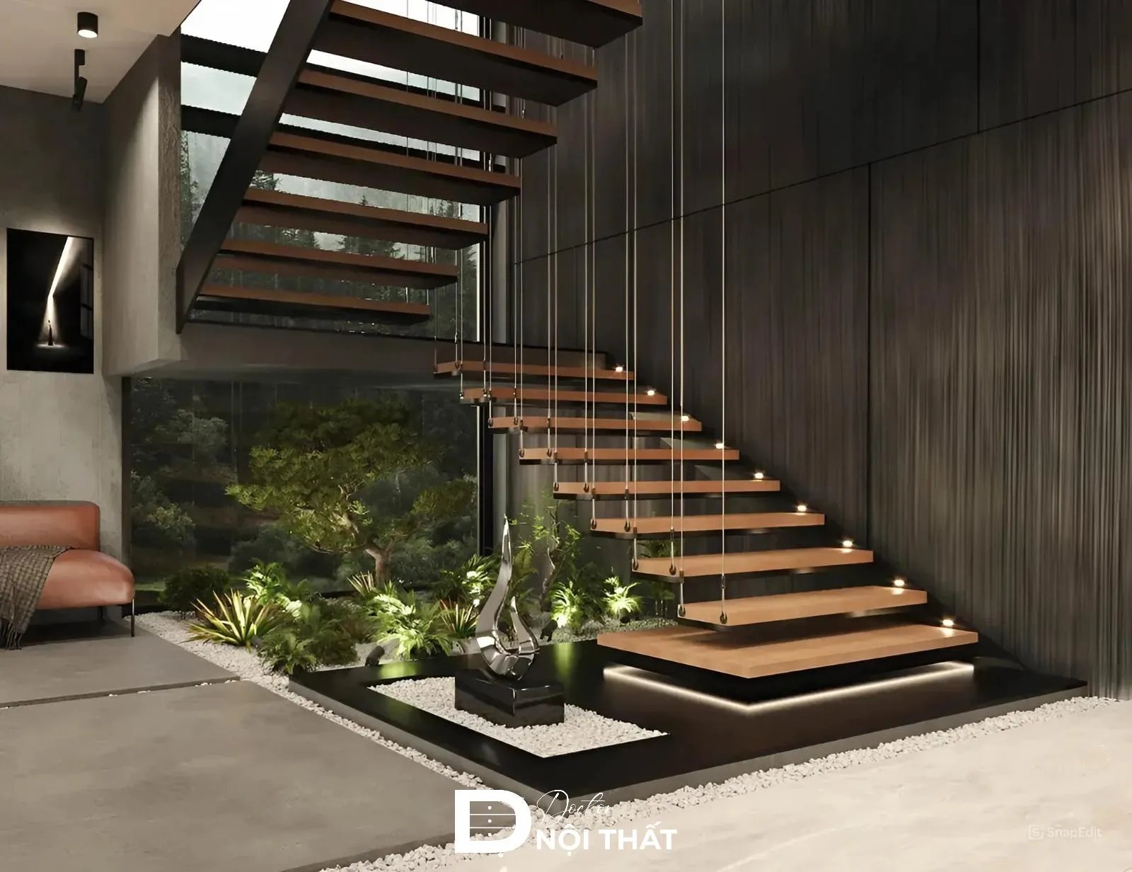 Tiểu cảnh cây xanh với đá cuội trắng dưới gầm cầu thang