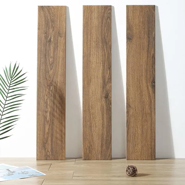 Hiện đại và thu hút hơn với mẫu gạch ốp chân tường vân gỗ nâu khói khổ dọc